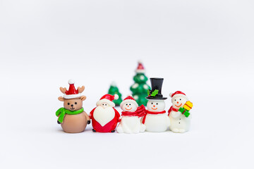 Christmas decoration doll collections on white background, snowman with Santa and reindeer with Christmas tree isolate on white background, Christmas decoration item, festive season concept