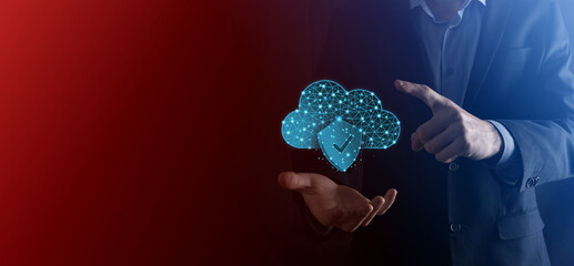 Cloud technology. Polygonal wireframe cloud storage sign with shield with a tick on dark blue....