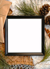 Christmas decorations and empty frame on table, background, mockup