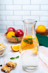 natural orange juice with fruits and nuts and cereals for a healthy breakfast or snack