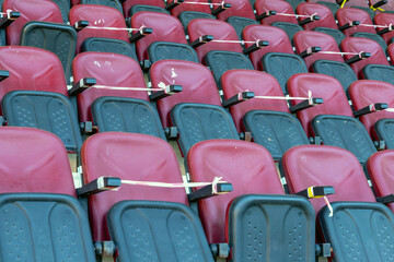 Fototapeta premium Empty stadium seats, because of covid pandemic lockdown.