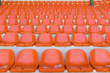 Empty stadium seats, because of covid pandemic lockdown.
