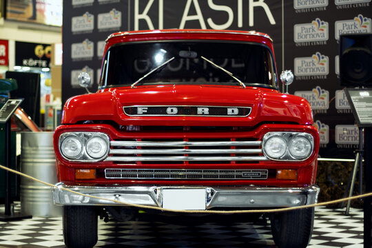 Front view of a Ford f100 red pick-up which produced in USA in 1960. Editorial Shot in Izmir Turkey.