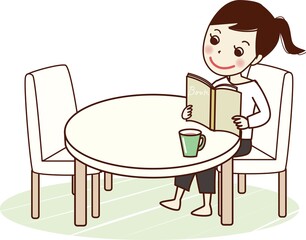 テーブルで本を読む笑顔の若い女性。