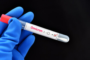 Obraz premium Omicron positive, nasopharyngeal swab positive with Omicron or B.1.1.529 variant of COVID-19 coronavirus