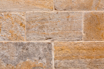 Medieval limestone blocks close up texture