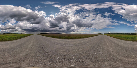 360 seamless hdri panorama view on gravel road before storm with overcast sky and dark cloud with...