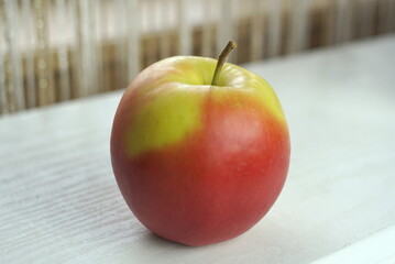 yellow red apple on the table 