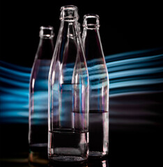 Photos of glass products on a black background