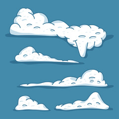 Snow caps vector cartoon set isolated on a blue background.