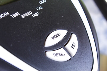 Mode reset and set buttons on gym equipment