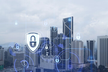 Hologram of padlock icons over panoramic city view of Kuala Lumpur to protect business, Malaysia, Asia. The concept of information security shields. Double exposure.