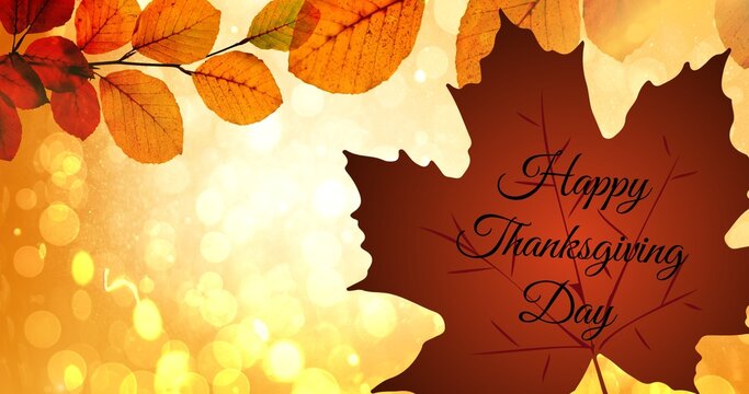Composite image of autumn leaves and happy thanksgiving text with copy space