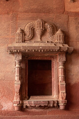 Window of an ancient abandoned building from the Mughal era in India