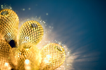 Fototapeta na wymiar Holiday light and sparkle background - lit garland lights and sparkle create a magical mood.