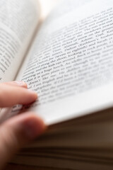 Fototapeta premium Reading, hand with book pages