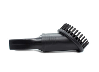Fototapeta na wymiar Vacuum cleaner brush. Plastic attachment for Furniture. Black Upholstery brush isolated on a white background. Side view.