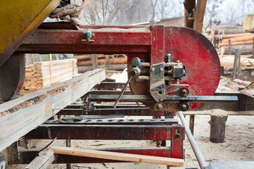 The process of processing wooden boards at a sawmill. Sawing and drying of wood. Timber industry