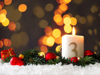 Candle of the third Advent burns