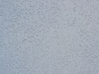 Texture of plastered gray wall close up