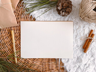 Empty vintage paper with Christmas decorations on table background mockup