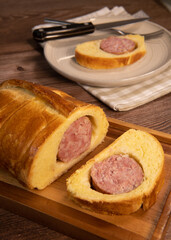 Lyonnais brioche baked with sausage style rustic, Morteau sausage