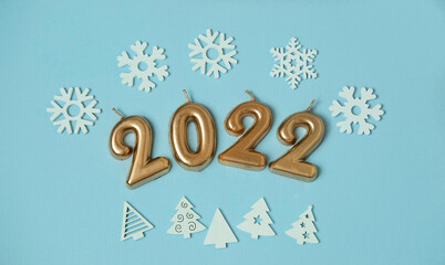 figures 2022 on a blue background , the concept of Christmas and medicine