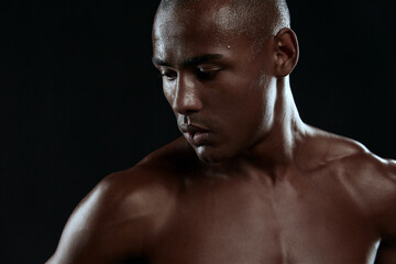 Fototapeta premium Cropped image of young tired athletic black man