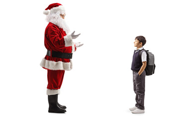 Sanyta cluas talking to a boy carrying a backpack and wearing a school uniform