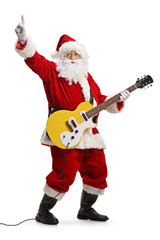 Santa claus playing an electirc guitar and pointing up