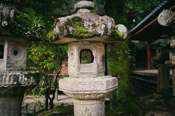 Traditional Stone Lanterns at a Temple in Kyoto, Japan