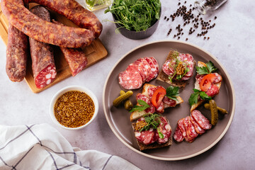 homemade dried meat on a background with vegetables