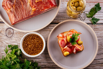 homemade dried meat on a background with vegetables