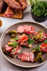 homemade dried meat on a background with vegetables
