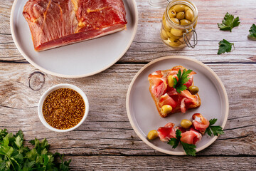 homemade dried meat on a background with vegetables