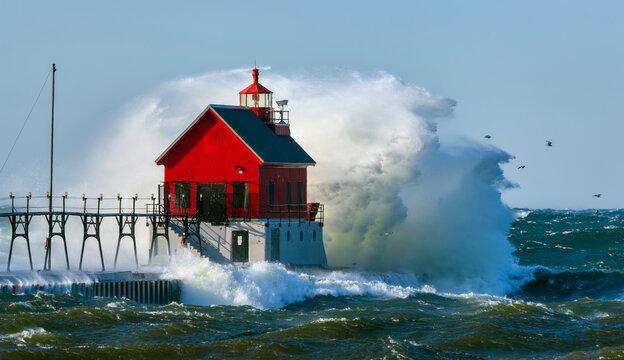 Grand Haven, Michigan Lighthouse On Lake Michigan Of The Great Lakes Enduring Gale Force Winds During An Autumn Storm.