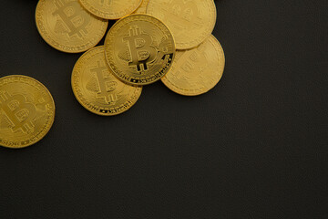 Bitcoin. Crypto currency Gold BTC. Coins on a black background.