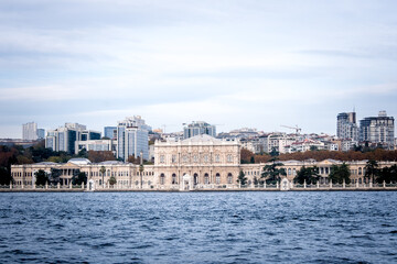 Fototapeta na wymiar Dolmabahçe Palace from the Bosphorus. Ottoman architectural structures.