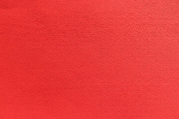 Fototapeta premium Red cardboard paper textured background. Christmas valentine`s day blank backdrop with copy space