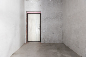 interior of the apartment without decoration in gray colors