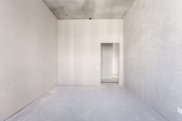 interior of the apartment without decoration in gray colors
