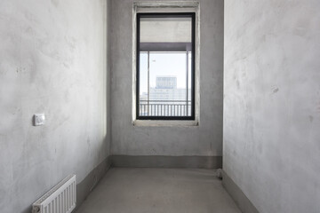 Fototapeta premium interior of the apartment without decoration in gray colors
