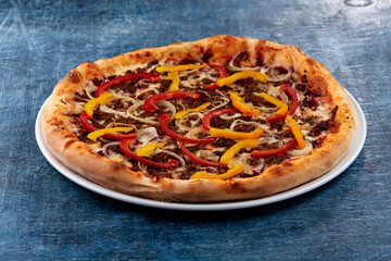 fresh pizza on the white plate