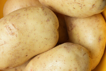Pile of potatoes as background. Food texture