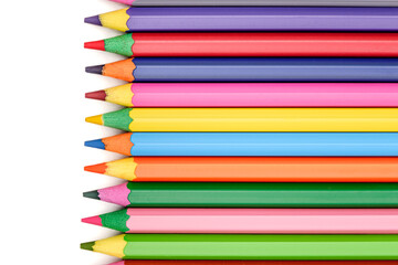 colored wooden pencils on white background