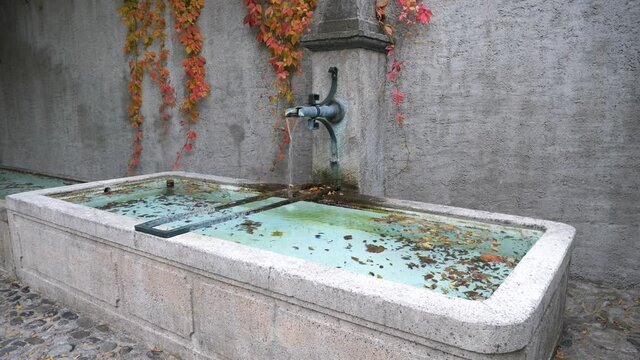 A fountain at the village of Perroy in Switzerland. The 29th October 2021.