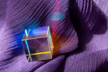 Optical glass cubes scatter spectrum light with all the colors of the rainbow on the surface