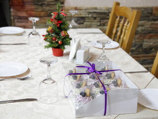 Wedding table setting with small christmas tree