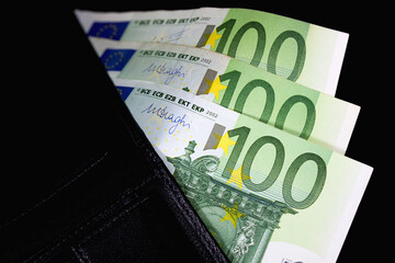One hundred euros close up and wallet. Inflation and spending