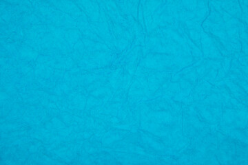 Blue crumpled paper decorative background texture